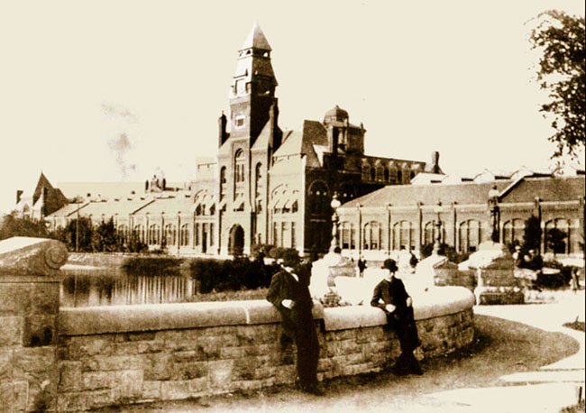 Solon Beman and Nathan Barrett relax next to the Pullman Factory complex, ca. 1890