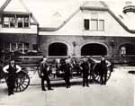 Posing in front of the firehouse at the stables